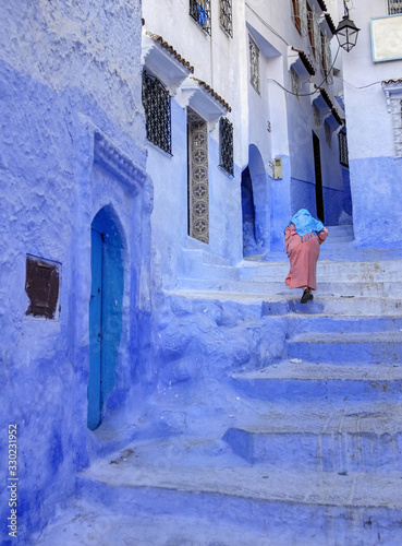 A street in the blue town Chefchaouen, Morocco © Boris Stroujko