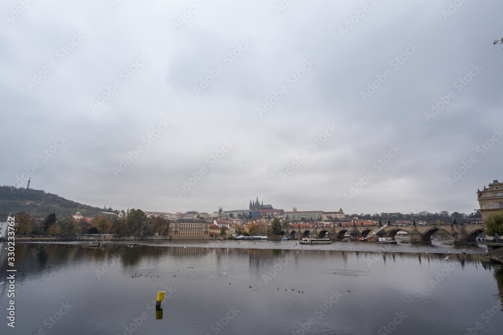 Panorama of the Old Town of Prague, Czech Republic, with a focus on Charles bridge (Karluv Most) and the Prague Castle (Prazsky hrad) seen from Vltava river. Panorama of the Old Town of Prague, Czech Republic, with a focus on Charles bridge (Karluv Most) and the Prague Castle (Prazsky hrad) seen from Vltava river.