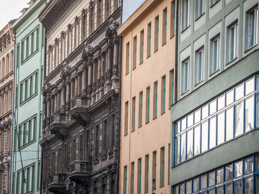 Facade of Old residential buildings from the 1930's in the city center of Prague, Czech Republic, used for accommodation on the real estate market