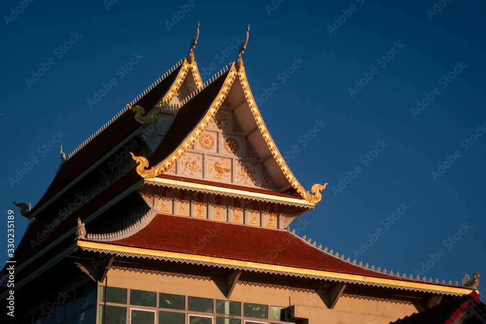 Golden rooftop of buddhist temple in Chiang Mai, Thailand