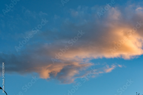 Beautiful sky with clouds at sunset. Soft light from the setting sun. Summer day © Дмитрий Федоров