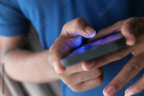 close up of person hand use smart phone