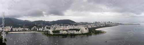 View of Bay displaying boats  apartments  hotels  offices and resorts in Rio de Janeiro on a cloudy day.