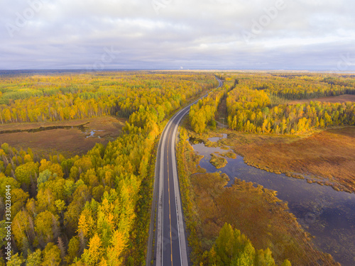 Alaska Route 3 aka George Parks Highway and Alaska landscape aerial view in fall with the morning sun light, at the south of Denali State Park at Susitna North, Alaska AK, USA.