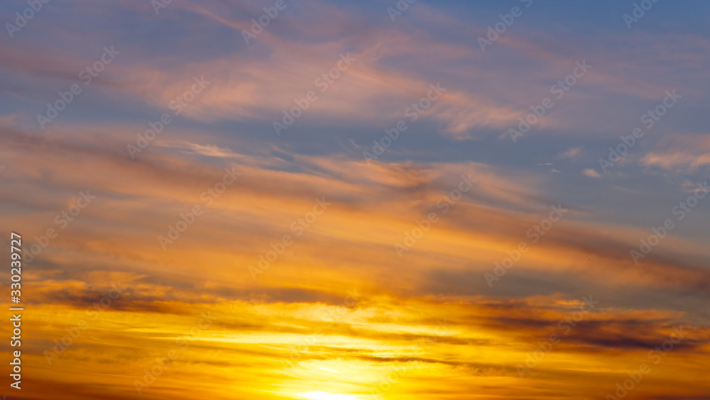Closeup of golden sunset and beautiful clouds