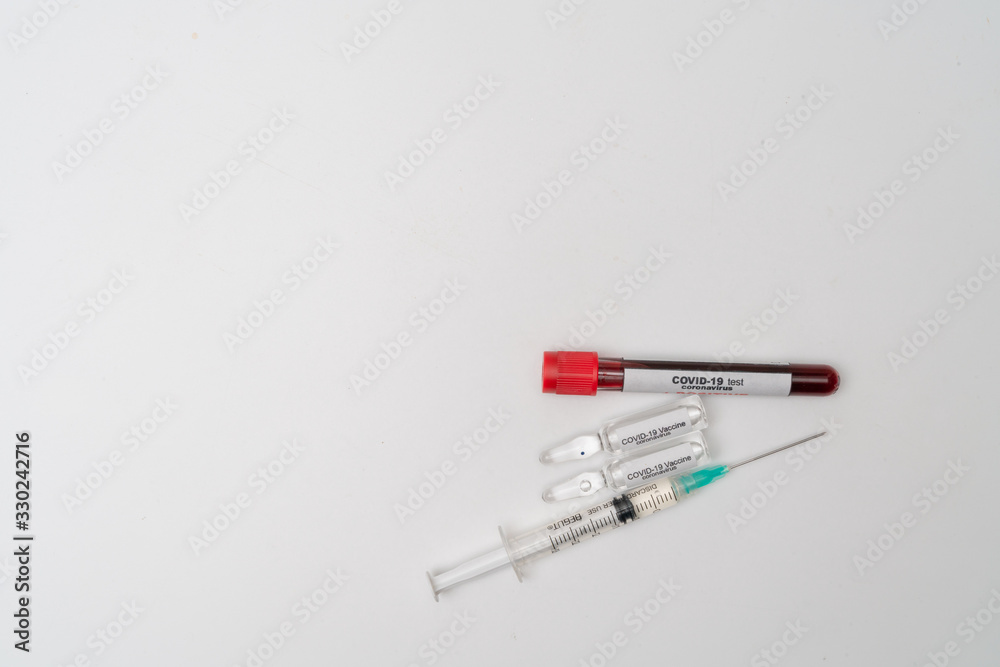 COVID 19 Coronavirus, infected blood sample in the sample tube, Vaccine and syringe injection It use for prevention, immunization and treatment from COVID-19 COVID 19 Coronavirus, infected blood sample in the sample tube, Vaccine and syringe injection It use for prevention, immunization and treatment from COVID-19