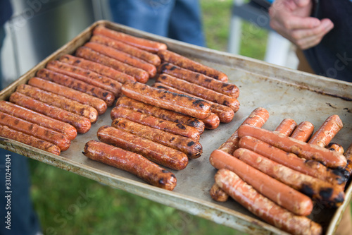 Grilled hotdogs for a community event.