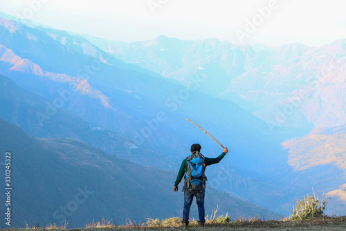Hiker on the top of mountain