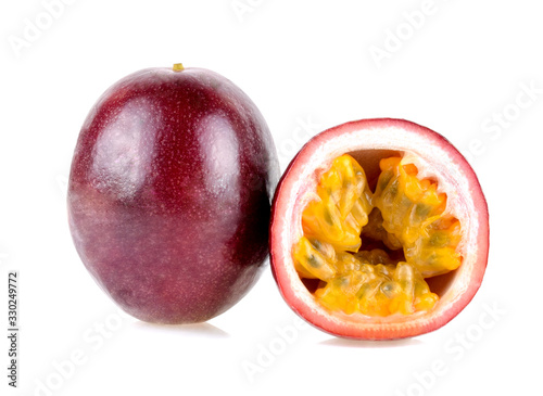 Purple passion fruit  with cut in half isolated on white background.