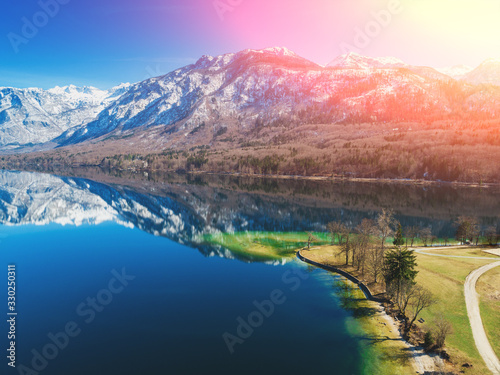 Mountain lake. Lake Bohinj in early spring. Triglav national park. Beautiful spring nature of Slovenia, Europe