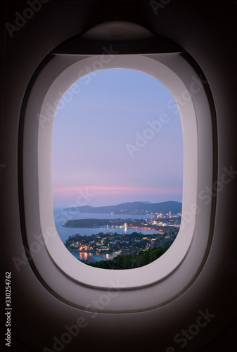 Kata beach and Karon beach viewpoint in twilight time and night light city view  view in window plane