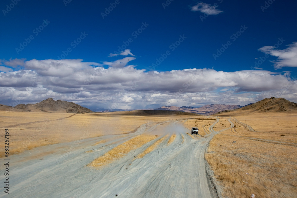 Road to Mongolia leading to the mountains Road to Mongolia leading to the mountains