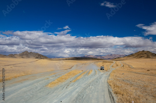 Road to Mongolia leading to the mountains © aksenium