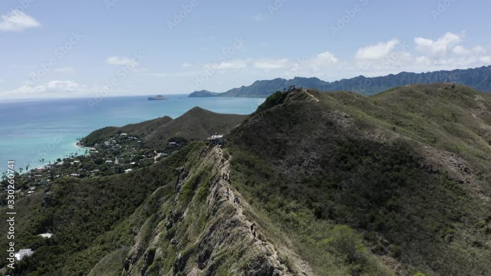Drone overlooking cliffside overlooking the beach - Pillbox Oahu Drone overlooking cliffside overlooking the beach - Pillbox Oahu