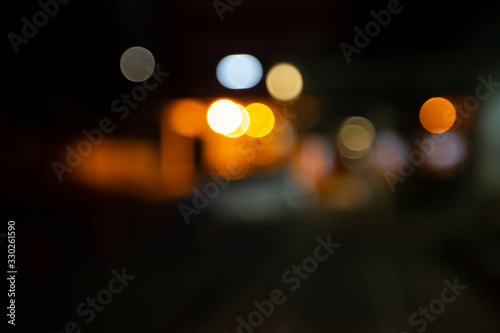 Bokeh light in the fastival in the evening at Bangkok , Thailand. Abstract bokeh yellow light of the city in night time and soft color.
