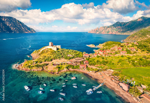 View from flying drone. Amazing morning view of Port de Girolata - place, where you can't get by car. Gorgeous summer scene of Corsica island, France, Europe. Amazing Mediterranean seascape.