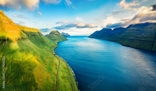 View from flying drone. Picturesque summer view of Kalsoy island. Attractive morning scene of Faroe Islands, Kingdom of Denmark, Europe. Beauty of nature concept background.