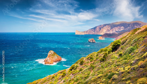 Attractive summer view of popular tourist destination - Concali Su Terrainu. Beautiful morning scene of Sardinia island, Italy, Europe. Astonishing seascape of Mediterranean sea. photo