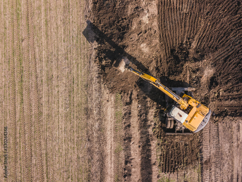 Excavator top down aerial drone  shot.