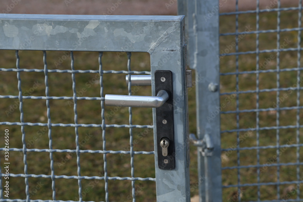 Metal mesh gate with internal lock and handle Metal mesh gate with internal lock and handle