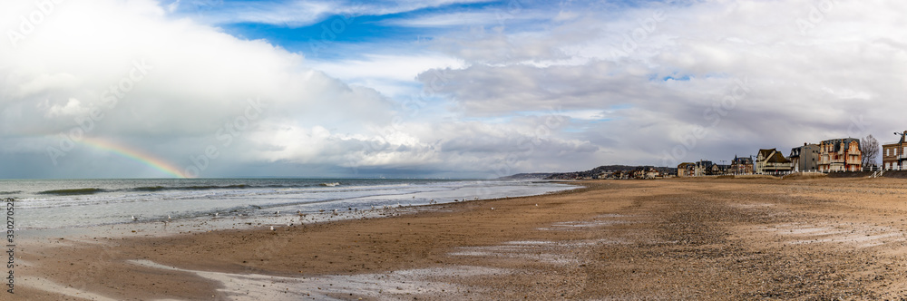 Panoramic view of Villers-sur-Mer waterfront at low tide - Normandy, France Panoramic view of Villers-sur-Mer waterfront at low tide - Normandy, France