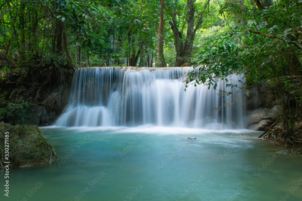 Huay Mae Khamin waterfalls in deep forest at Srinakarin National Park ,Kanchanaburi ,A beautiful stream water famous rainforest waterfall in Thailand