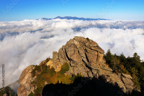Big rock with clouds on Mizugaki mountain in Japan photo