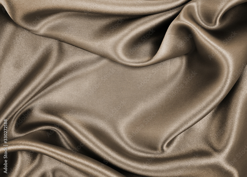 Smooth elegant brown silk or satin texture as abstract background. Luxurious background design. In Sepia toned. Retro style Smooth elegant brown silk or satin texture as abstract background. Luxurious background design. In Sepia toned. Retro style
