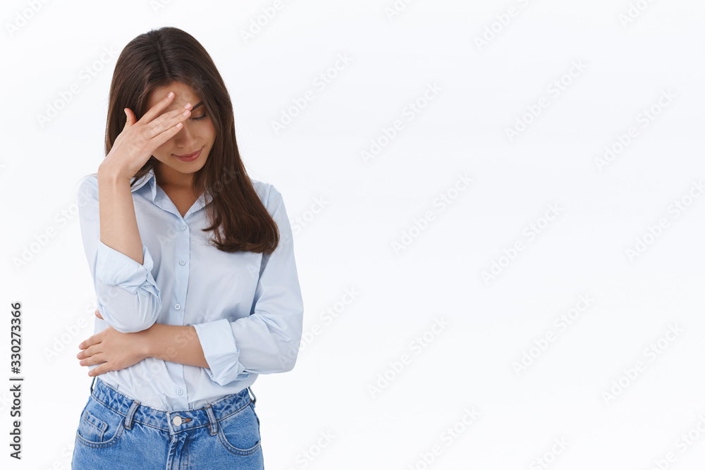 Oh gosh dont look at me. Embarrassed annoyed brunette female hiding her face with facepalm, look down trying avoid eye contact with her ex boyfriend acting stupid and embarrassing, white background Oh gosh dont look at me. Embarrassed annoyed brunette female hiding her face with facepalm, look down trying avoid eye contact with her ex boyfriend acting stupid and embarrassing, white background