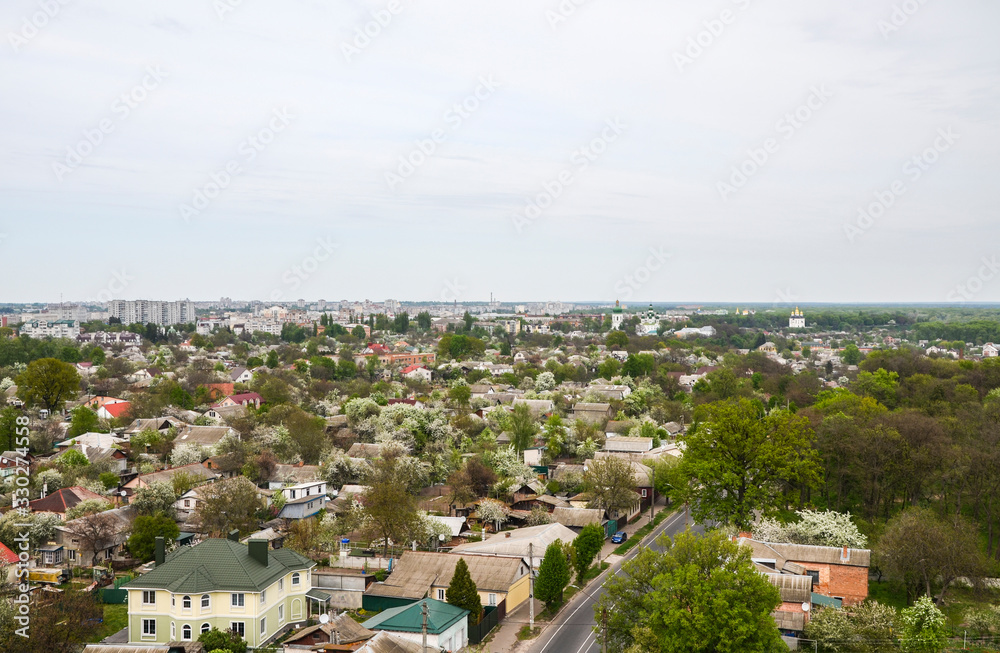 Panorama of the Ukrainian village in the spring. View from the top of the hill.
