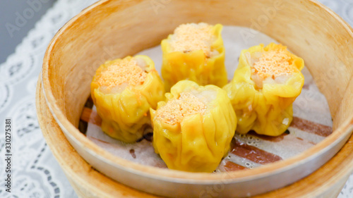 Delicious Chinese steamed shrimp dimsum in bamboo containers