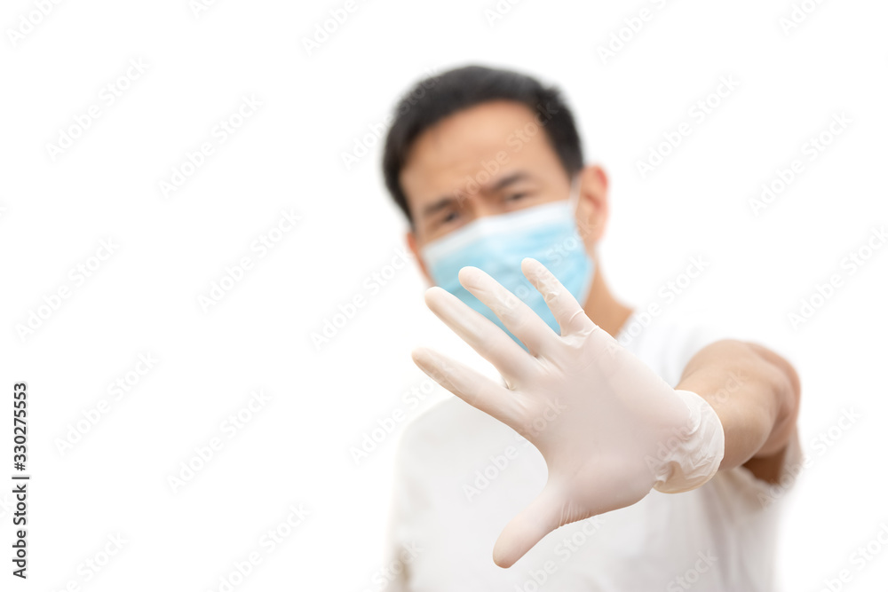 The image face of a young Asian man wearing a mask to prevent germs, toxic fumes, and dust. Prevention of bacterial infection in the air in a white background The image face of a young Asian man wearing a mask to prevent germs, toxic fumes, and dust. Prevention of bacterial infection in the air in a white background