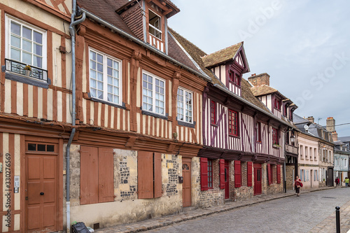 Honfleur, France. Colorful half-timbered buildings on Bavole street © Valery Rokhin