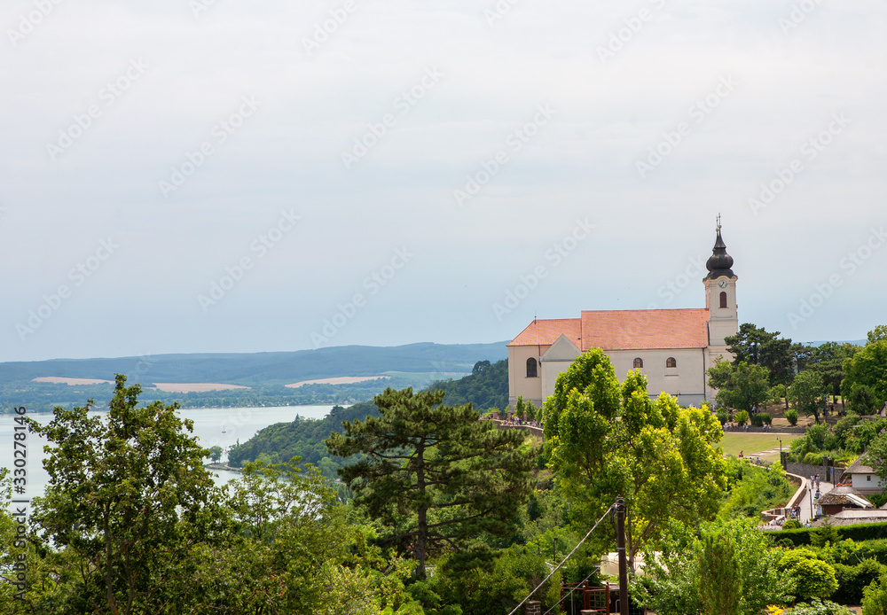 Tihany abbey viewed from the village with the lake Balaton in Hungary