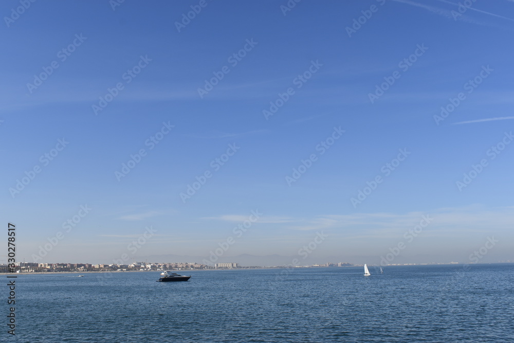 The waters of the port with yachts and city