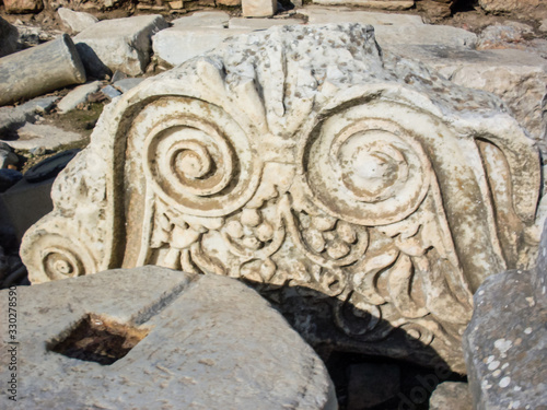 Ancient ruins in Ephesus Izmir Turkey - archeology background. Marble reliefs in Ephesus historical ancient city