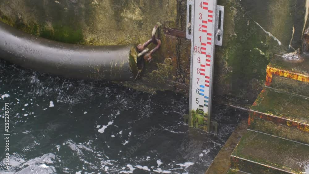 Water Level Indicator on Stormy Weather on Baltic Sea Shore
