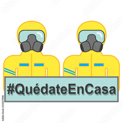 Man wearing protective suit (hazmat suit , decontamination suit) shows sign Quedate en casa (Stay at home). Preventive measures. Steps to protect yourself