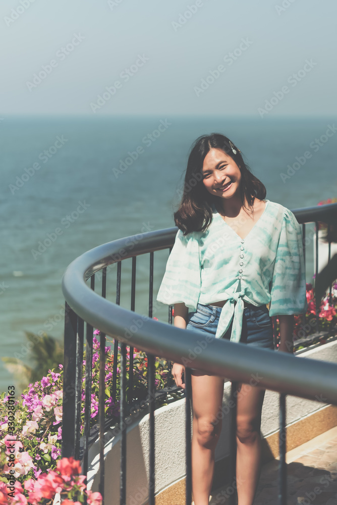 Woman relax at sea viewpoint in concept travel Woman relax at sea viewpoint in concept travel