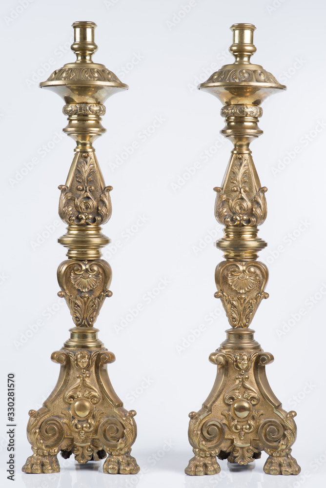 two classic bronze chandelier on a white background, ancient candlesticks studio photo, antique candlesticks isolated, brass candelabra, vintage candlesticks two classic bronze chandelier on a white background, ancient candlesticks studio photo, antique candlesticks isolated, brass candelabra, vintage candlesticks