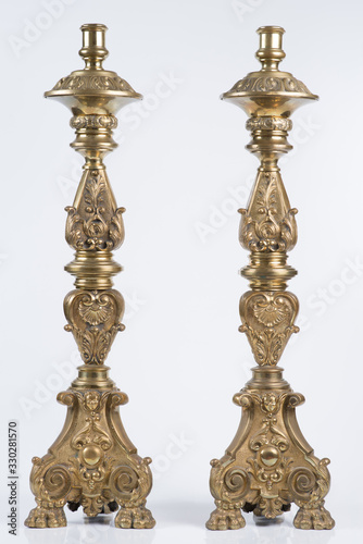 two classic bronze chandelier on a white background, ancient candlesticks studio photo, antique candlesticks isolated, brass candelabra, vintage candlesticks