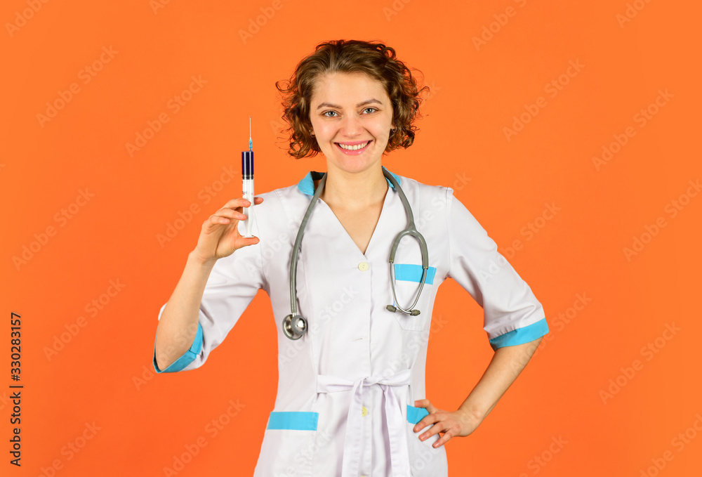 Doctor with syringe is preparing for injection. injection against coronavirus. virus epidemic outbreak. immunity vaccination. nurse wear uniform. Physician giving vaccine. HPV concept Doctor with syringe is preparing for injection. injection against coronavirus. virus epidemic outbreak. immunity vaccination. nurse wear uniform. Physician giving vaccine. HPV concept