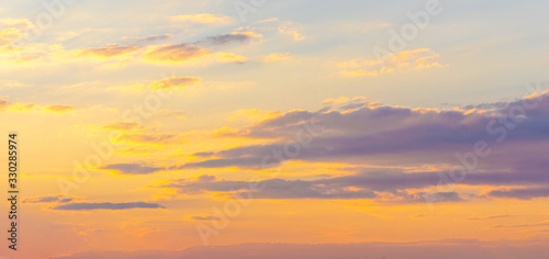 Picturesque sky with clouds during sunset, background for design_