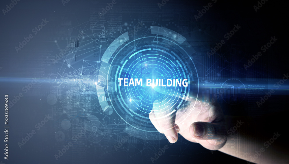 Hand touching TEAM BUILDING button, modern business technology concept Hand touching TEAM BUILDING button, modern business technology concept