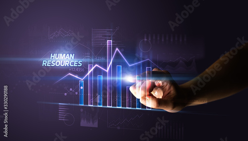 Hand touching HUMAN RESOURCES button, business concept