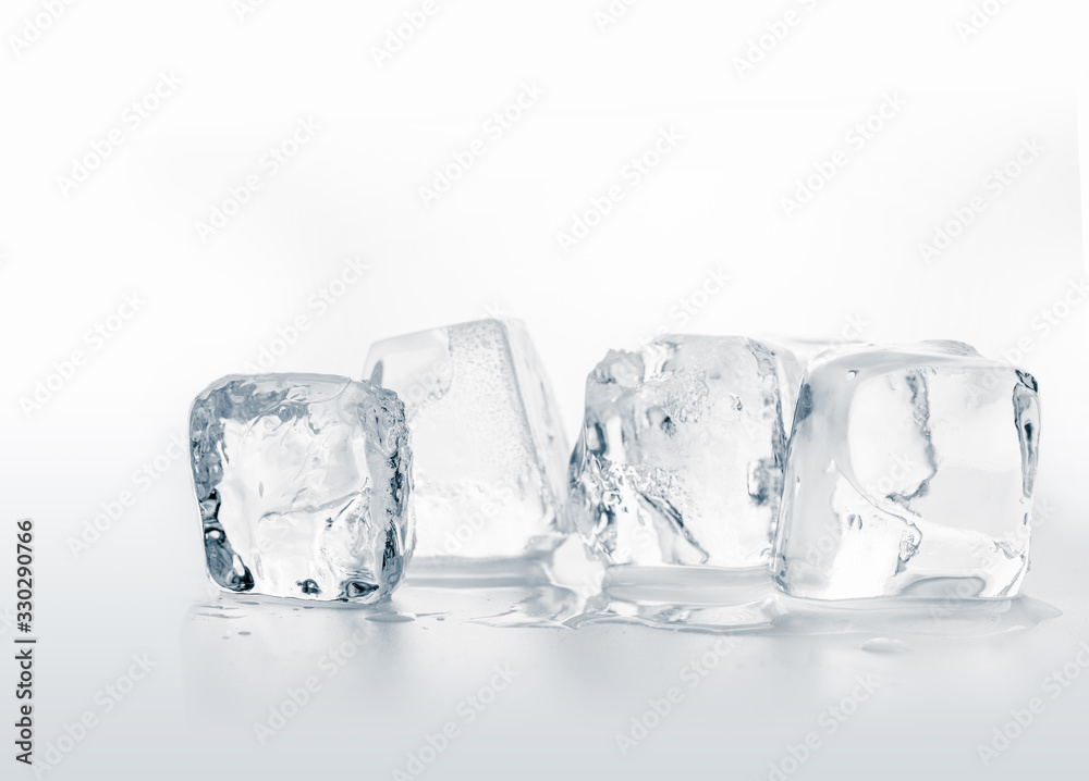 Group of natural crystal clear melting ice cubes on white background. Group of natural crystal clear melting ice cubes on white background.