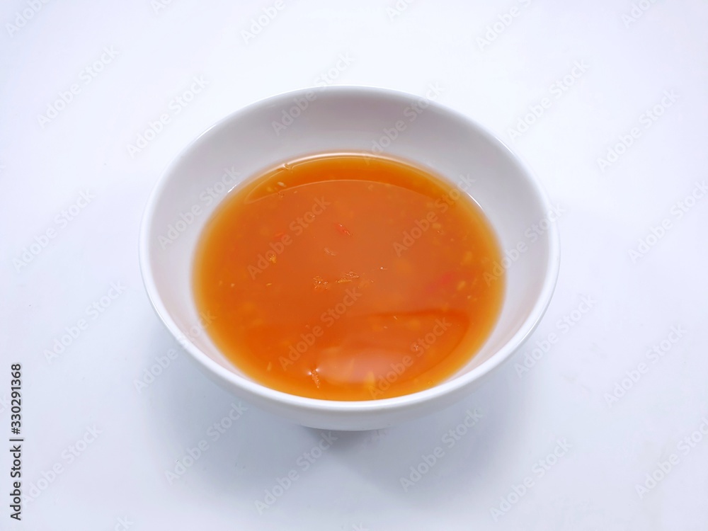Thai food style, Top view of spicy seafood dipping sauce in white bowl Thai food style, Top view of spicy seafood dipping sauce in white bowl
