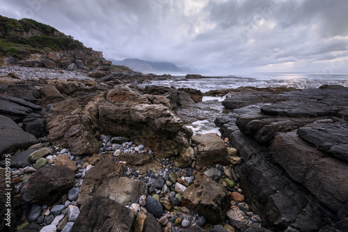 A beautiful moody seascape taken in hermanus, South Africa, on a stormy, cloudy morning.