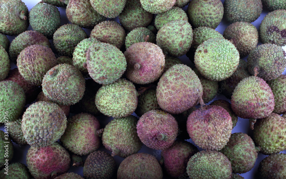 Lychee background. Tropical fruits Lychee background. Tropical fruits