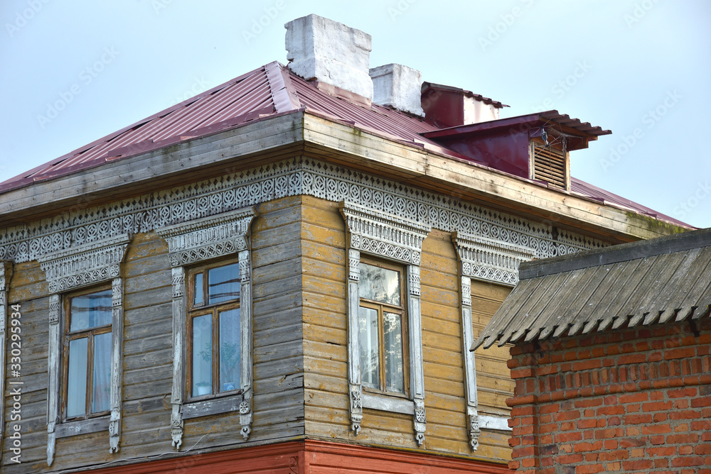 Old wooden house with wooden carving, Rostov, one of oldest town and tourist center of Golden Ring, Yaroslavl region, Russia